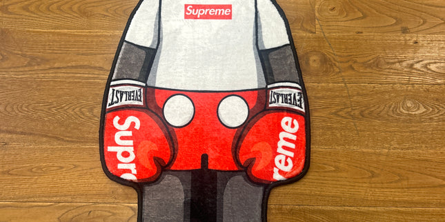 Supreme kaws