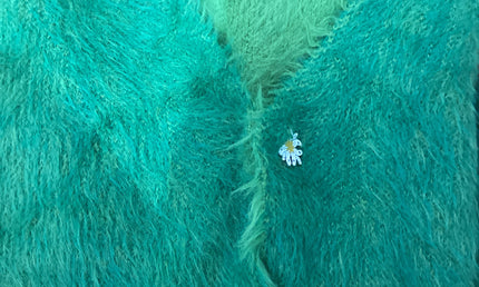 Furry green vest