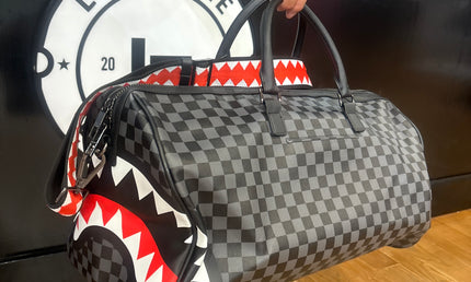 Spray ground travel bag