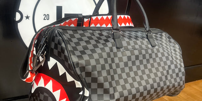 Spray ground travel bag
